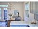 Dining area with views of the outside, featuring a stylish chandelier at 931 Ramseur St, Durham, NC 27701
