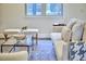 Cozy living room showcasing a modern glass table and plush white sofa at 931 Ramseur St, Durham, NC 27701