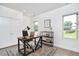 Well-lit office with a modern desk, comfortable chair, stylish decor, and ample natural light at 931 Ramseur St, Durham, NC 27701