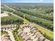 Aerial shot of the residential community surrounded by lush greenery, showing proximity to amenities at 1020 Regency Cottage Pl, Cary, NC 27518