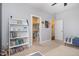 bedroom with a walk-in closet, toys, and neutral walls at 1020 Regency Cottage Pl, Cary, NC 27518
