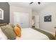 Bedroom featuring an ensuite bathroom, closet, and neutral walls at 1020 Regency Cottage Pl, Cary, NC 27518