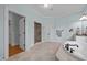 Modern bathroom boasts a glass shower, soaking tub, and neutral tile at 1028 Harpers Ridge Ct, Wake Forest, NC 27587