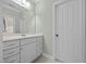 Bright bathroom featuring a white vanity with lots of storage and light green walls at 1028 Harpers Ridge Ct, Wake Forest, NC 27587
