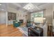 Bright living room features a fireplace, built-in shelving, and coffered ceilings at 1028 Harpers Ridge Ct, Wake Forest, NC 27587