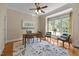 Comfortable home office with hardwood floors, offering a quiet workspace with ample natural light at 1028 Harpers Ridge Ct, Wake Forest, NC 27587