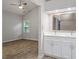 Primary bathroom with double vanity, shower, and access to bedroom area at 108 Ellsworth Pl, Cary, NC 27511