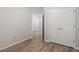 Bedroom with view to bathroom, closet, and access to the next room at 108 Ellsworth Pl, Cary, NC 27511