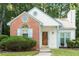 Charming single-Gathering home with a brick facade, decorative trim, and well-maintained landscaping at 108 Ellsworth Pl, Cary, NC 27511