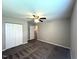Bedroom featuring a ceiling fan, carpeted flooring, and natural light from windows at 1100 Birkdale Dr, Mebane, NC 27302