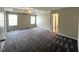 Bedroom featuring a ceiling fan, carpeted flooring, and natural light from windows at 1100 Birkdale Dr, Mebane, NC 27302