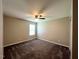 Spacious bedroom features neutral paint, soft carpet and ceiling fan at 1100 Birkdale Dr, Mebane, NC 27302