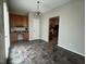 Dining area includes built in cabinets, desk area and view of the kitchen at 1100 Birkdale Dr, Mebane, NC 27302