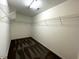 Spacious walk-in closet with wire shelving and neutral walls at 1100 Birkdale Dr, Mebane, NC 27302