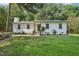 Charming home with a well-maintained front yard and inviting entrance at 1104 Suterland Rd, Cary, NC 27511