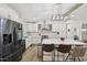 Spacious kitchen with island, stainless appliances, and ample storage at 1104 Suterland Rd, Cary, NC 27511