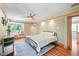 Cozy bedroom featuring hardwood floors, a comfy window seat, and soft natural light, perfect for relaxation at 1209 Ravens Point Cir, Raleigh, NC 27614