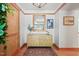 Welcoming foyer with hardwood floors, a console table, and stylish decor at 1209 Ravens Point Cir, Raleigh, NC 27614