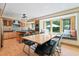 Bright kitchen with light wood cabinets, stainless steel appliances, and a cozy breakfast nook at 1209 Ravens Point Cir, Raleigh, NC 27614