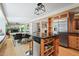 Open-concept kitchen with an island and views into the dining and living areas at 1209 Ravens Point Cir, Raleigh, NC 27614