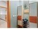 Contemporary powder room featuring modern vanity and vessel sink with custom lighting and storage at 1209 Ravens Point Cir, Raleigh, NC 27614