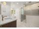 Luxurious bathroom with double vanity, soaking tub, and walk-in shower at 1212 Gunnison Pl, Raleigh, NC 27609