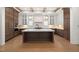 Modern kitchen with a large island, stainless steel appliances, and custom wood cabinets at 1212 Gunnison Pl, Raleigh, NC 27609