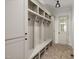 Mudroom features storage lockers, bench, and brick floors at 1212 Gunnison Pl, Raleigh, NC 27609