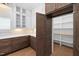 Walk-in pantry featuring custom shelving and storage space at 1212 Gunnison Pl, Raleigh, NC 27609