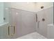 Bathroom featuring a modern walk-in shower with glass door and designer fixtures at 1212 Gunnison Pl, Raleigh, NC 27609