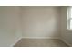 This cozy bedroom features neutral walls and carpet, perfect for creating a relaxing personal space at 1218 Tredenham Way, Durham, NC 27703