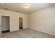 Carpeted bedroom with natural light, showcasing doorway access to other rooms at 1444 Heron Pond St, Raleigh, NC 27604