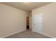 Bedroom with neutral walls, carpet flooring, a closet and bathroom access at 1444 Heron Pond St, Raleigh, NC 27604
