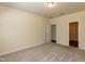 Spacious bedroom with carpeted floor and view into closet and bathroom at 1444 Heron Pond St, Raleigh, NC 27604