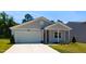 Charming single Gathering home with a two car garage and well manicured front lawn at 1444 Heron Pond St, Raleigh, NC 27604