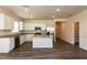Well-designed kitchen featuring stainless steel appliances, granite countertops, and ample cabinet space at 1444 Heron Pond St, Raleigh, NC 27604