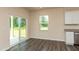 Bright living space featuring sliding glass doors and a window allowing tons of natural light at 1444 Heron Pond St, Raleigh, NC 27604