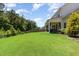 Expansive, well-maintained lawn with mature landscaping providing a private outdoor space at 1502 Spring Overlook Ln, Hillsborough, NC 27278