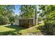 Picture of the screened in back porch and backyard of the home at 1524 Wedgewood Dr, Graham, NC 27253
