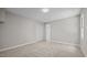 Bedroom with neutral carpet, trim and paint and standard closet at 1524 Wedgewood Dr, Graham, NC 27253