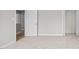 Bedroom with neutral carpet, trim and paint and a door to another room at 1524 Wedgewood Dr, Graham, NC 27253