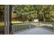 A spacious deck perfect for enjoying the private, tree-lined backyard at 1524 Wedgewood Dr, Graham, NC 27253