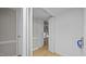 Small storage room with wood floors and white walls at 1524 Wedgewood Dr, Graham, NC 27253