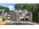 A lovely new construction home with a spacious three-car garage and neutral grey paint at 1529 Lake Adventure Ct, Raleigh, NC 27613