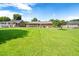 Expansive, well-maintained backyard, ideal for outdoor activities and entertaining with lush green grass at 1702 Pinecrest St, Burlington, NC 27215