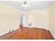 Bedroom with hardwood floors, closet and ensuite bathroom at 1702 Pinecrest St, Burlington, NC 27215