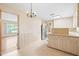 Spacious kitchen with a breakfast bar that opens up to an additional living area at 1702 Pinecrest St, Burlington, NC 27215
