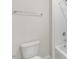 Bathroom featuring a toilet and shower with silver hardware and white walls at 195 Babbling Creek Dr, Youngsville, NC 27596