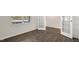 Bright bedroom featuring a window and french doors leading to other parts of the home at 195 Babbling Creek Dr, Youngsville, NC 27596