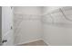 Spacious walk-in closet with shelving, providing ample storage and organization at 195 Babbling Creek Dr, Youngsville, NC 27596